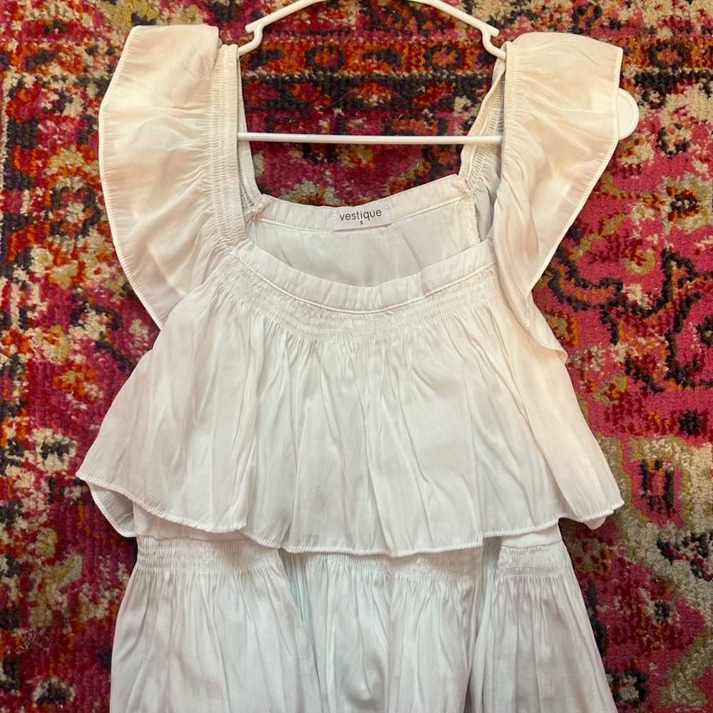 Vestique ruffle top